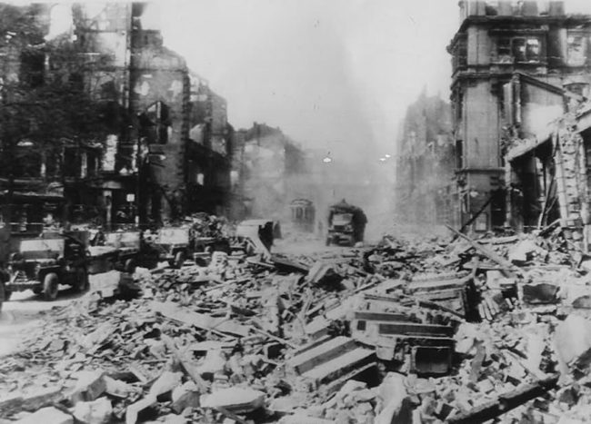Ruins_of_Plauen_Vogtland_Germany_Willys_MB_Jeep_GMC_CCKW_Truck_20_April_1945