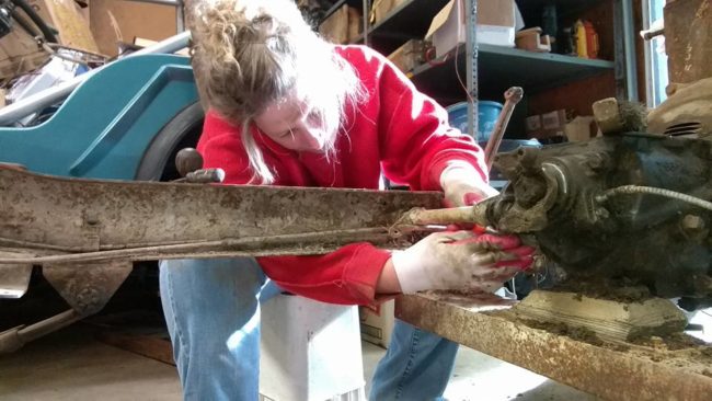 Ann cleaning Rusty's Frame.