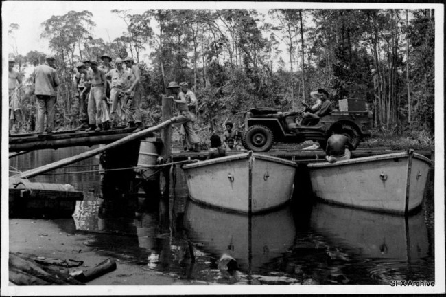 1943-06-19-jeep-driving-across-boats1