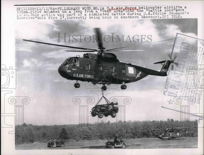 1964-11-11-helicopter-lifts-m38a1