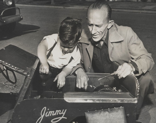 1948-jimmy-crabtree-working-on-jeep