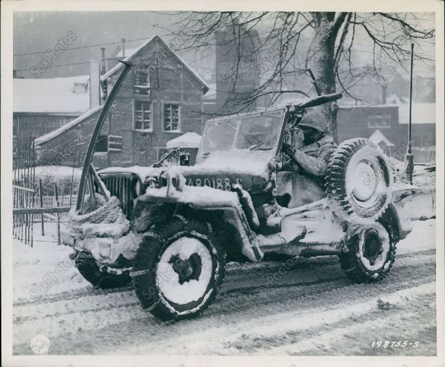 1945-01-19-30th-division-jeep-belgium-snow1