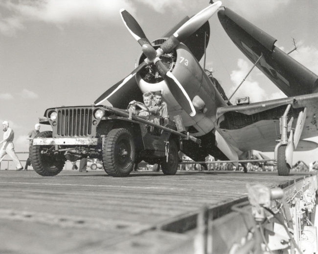 Flight deck - Essex Jeep towing dive bomber